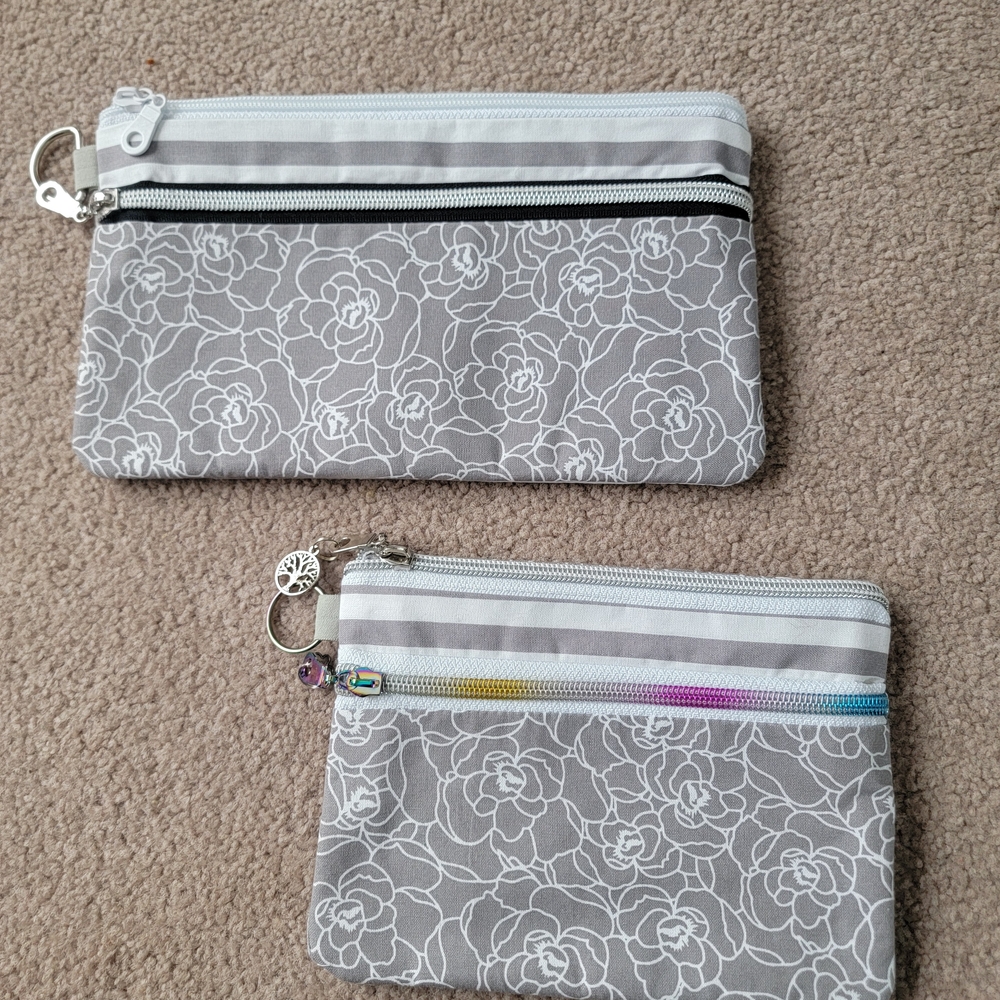 Floral Gray and White Zipper Pouches